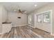 Living room with a sink and a view to the outside double doors and ceiling fan at 159 Badin Lake Cir, New London, NC 28127