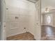 A pantry features wire shelving and a laundry hook up ready for stacking laundry at 159 Badin Lake Cir, New London, NC 28127