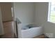 Bathroom with bathtub and granite accent at 1145 Philbeck Rd # 11, York, SC 29745