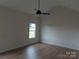 Bright bedroom with ceiling fan and hardwood floors at 1145 Philbeck Rd # 11, York, SC 29745