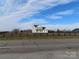 Two-story white house with a gray roof, viewed from across a road at 1145 Philbeck Rd # 11, York, SC 29745