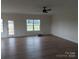 Spacious living room with hardwood floors and a door to the outside at 1145 Philbeck Rd # 11, York, SC 29745