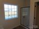 Modern bathroom with a glass shower door and window at 1187 Philbeck Rd # 13, York, SC 29745