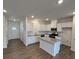 Modern kitchen with island and stainless steel appliances at 5033 Falstone Dr, Charlotte, NC 28269