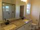 Bathroom features double vanity with granite countertop and walk-in shower at 1169 Philbeck Rd # 12, York, SC 29745