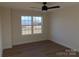 Spacious bedroom with large window and hardwood floors at 1169 Philbeck Rd # 12, York, SC 29745