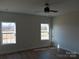 Bright bedroom with two windows and ceiling fan at 1169 Philbeck Rd # 12, York, SC 29745