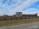 Two-story house with blue siding, white trim, and a black fence at 1169 Philbeck Rd # 12, York, SC 29745