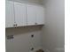 Laundry room with white cabinets and vinyl flooring at 1169 Philbeck Rd # 12, York, SC 29745