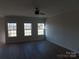 Living Room with hardwood floors and three windows at 1169 Philbeck Rd # 12, York, SC 29745