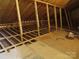 Unfinished attic space with plywood flooring and framing at 1169 Philbeck Rd # 12, York, SC 29745