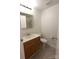 Full bathroom with vanity, toilet, and mirror at 1645 Arlyn Cir # J, Charlotte, NC 28213