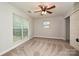 Bedroom with large window and closet at 17810 Half Moon Ln # Q, Cornelius, NC 28031