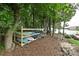 Wooden kayak rack with multiple kayaks ready for use at 17810 Half Moon Ln # Q, Cornelius, NC 28031