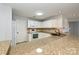 Kitchen with double sink and granite countertops at 17810 Half Moon Ln # Q, Cornelius, NC 28031