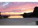 Scenic lake view with sunset and residential area at 17810 Half Moon Ln # Q, Cornelius, NC 28031