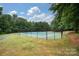 Tennis court nestled in a wooded area at 17810 Half Moon Ln # Q, Cornelius, NC 28031