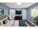 Main bedroom with wood floors and a view of en-suite bathroom at 37 Knox St, Salisbury, NC 28144