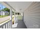 Spacious front porch with white railings and street view at 37 Knox St, Salisbury, NC 28144