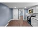 Modern kitchen with white cabinets and granite countertops at 37 Knox St, Salisbury, NC 28144