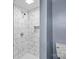 Clean shower with marble tile and built-in niche at 37 Knox St, Salisbury, NC 28144