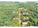 Aerial view of multiple lots surrounded by lush greenery at 4658 Sugar Plum Ln, Davidson, NC 28036