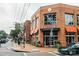 Charming brick storefront with ample windows and awnings along a lively street at 4658 Sugar Plum Ln, Davidson, NC 28036