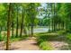 Scenic lakeside trail with tranquil pond views at 1052 Ventosa Dr, Denver, NC 28037