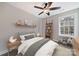 Cozy bedroom with a single bed, and built-in shelving at 204 Kimball Rd, China Grove, NC 28023