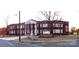 Brick elementary school building with large columns and signage at 204 Kimball Rd, China Grove, NC 28023