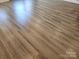 Light brown wood-look vinyl plank flooring at 204 Kimball Rd, China Grove, NC 28023