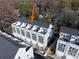 Aerial view of townhomes showcasing architecture, landscaping, and community layout at 1409 Collier Walk Aly # Csw0104, Charlotte, NC 28205