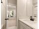 Bright bathroom featuring neutral paint, natural light, and sleek hardware at 1413 Collier Walk Aly # Csw0106, Charlotte, NC 28205