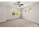Inviting bedroom with large windows providing natural light and a serene view of the outdoors at 1413 Collier Walk Aly # Csw0106, Charlotte, NC 28205