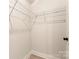 Bright walk-in closet featuring wire shelving, providing ample storage space and organization at 1413 Collier Walk Aly # Csw0106, Charlotte, NC 28205