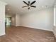 Large living room featuring hardwood floors, recessed lighting, and an open layout at 1211 E 34Th St # Csw0313, Charlotte, NC 28205