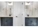 Bathroom with double sink vanity, shaker cabinets, and decorative lighting at 2003 Cedar Falls Dr # 69, Waxhaw, NC 28173