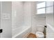 Bathroom with tile surround shower and brushed nickel fixtures at 2003 Cedar Falls Dr # 69, Waxhaw, NC 28173