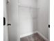 Walk-in closet features wire shelving and neutral carpeting at 2003 Cedar Falls Dr # 69, Waxhaw, NC 28173