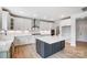 Well-appointed kitchen with island, stainless steel appliances, and ample storage at 2003 Cedar Falls Dr # 69, Waxhaw, NC 28173