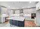 Stylish kitchen with white cabinets, tile backsplash, stainless appliances, and a central island at 2003 Cedar Falls Dr # 69, Waxhaw, NC 28173