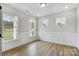 Bright living space with trim, windows overlooking the front yard, and recessed lighting above at 2003 Cedar Falls Dr # 69, Waxhaw, NC 28173