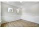 A bright living space with trim, windows, and recessed lighting, perfect for making it your own at 2003 Cedar Falls Dr # 69, Waxhaw, NC 28173