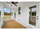 Inviting outdoor porch with stained wood flooring, white railings, and exterior views at 2003 Cedar Falls Dr # 69, Waxhaw, NC 28173