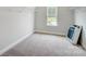 Spacious walk-in closet with wire shelving and a window at 2003 Cedar Falls Dr # 69, Waxhaw, NC 28173