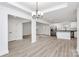 Open concept dining room with chandelier and hardwood floors at 6100 Lowder Rd, Salisbury, NC 28147
