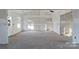 Unfinished living room with large windows and high ceilings at 6100 Lowder Rd, Salisbury, NC 28147