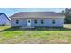 Exterior of house with blue siding and green lawn leading up to back of the house at 6122 Lowder Rd, Salisbury, NC 28147