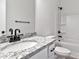 Bathroom featuring a single sink, white granite counters, modern fixtures, and a shower-tub combination with a black shower head at 6122 Lowder Rd, Salisbury, NC 28147
