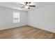 Bright bedroom with hardwood floors and window at 6122 Lowder Rd, Salisbury, NC 28147